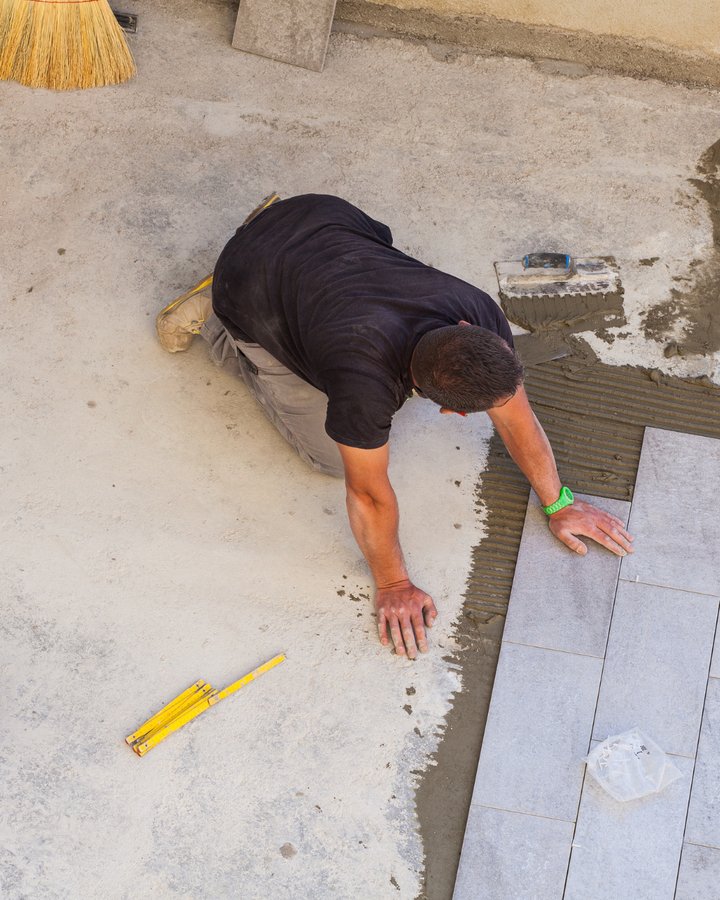 Contemporary kitchen with dark cabinets and center island