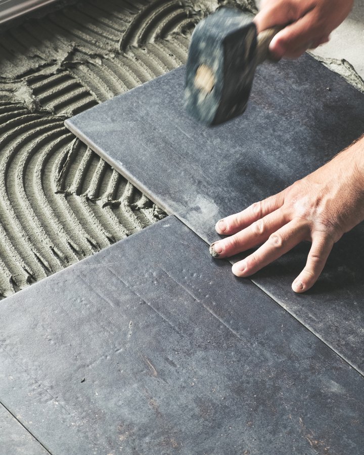 Luxury bathroom renovation with marble tile and walk-in shower in Essex County NJ